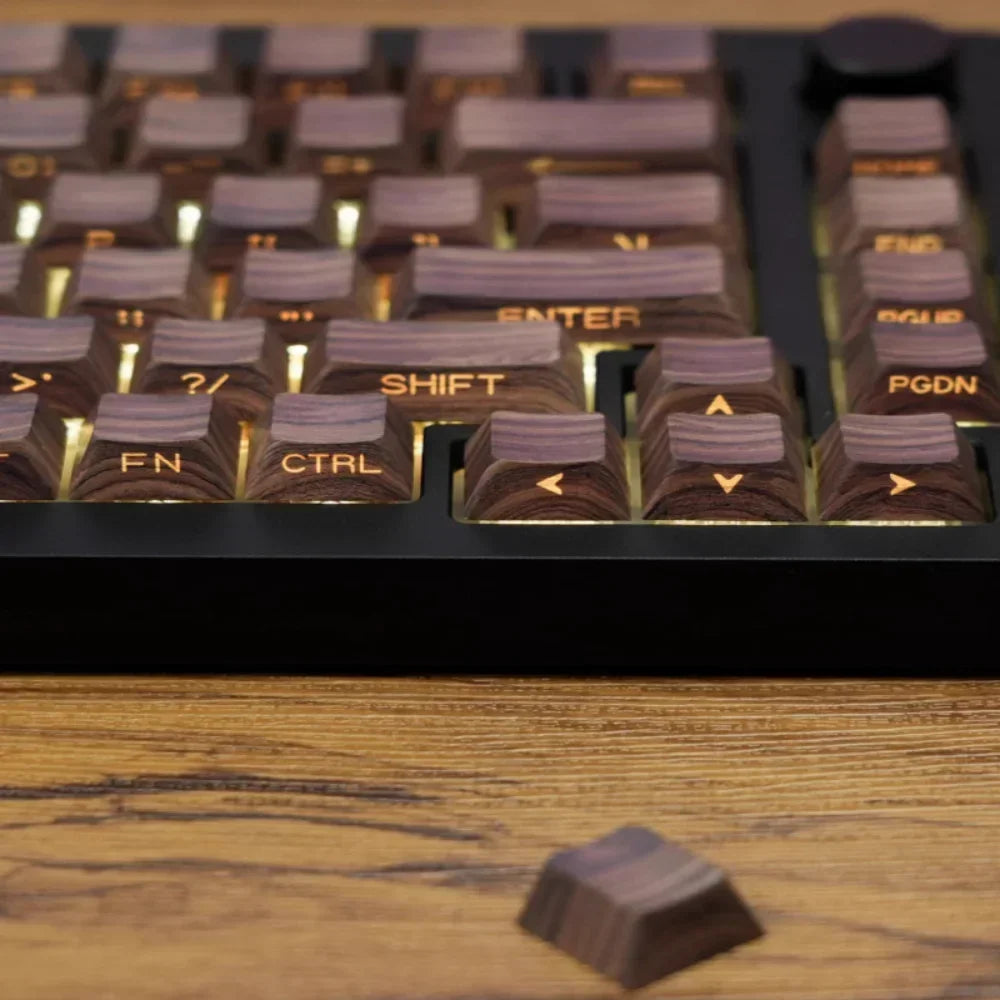 Cherry profile 136-key side-printed wood grain keycap set installed on a mechanical keyboard with RGB lighting and transparent font